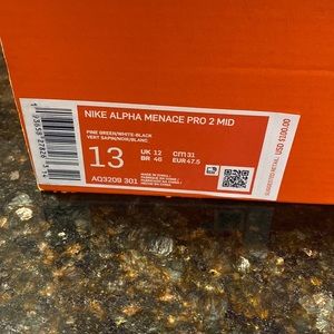 Football cleats, size 13